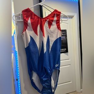 Gymnastics leotard size medium - slight blue stain on chest hardly noticeable